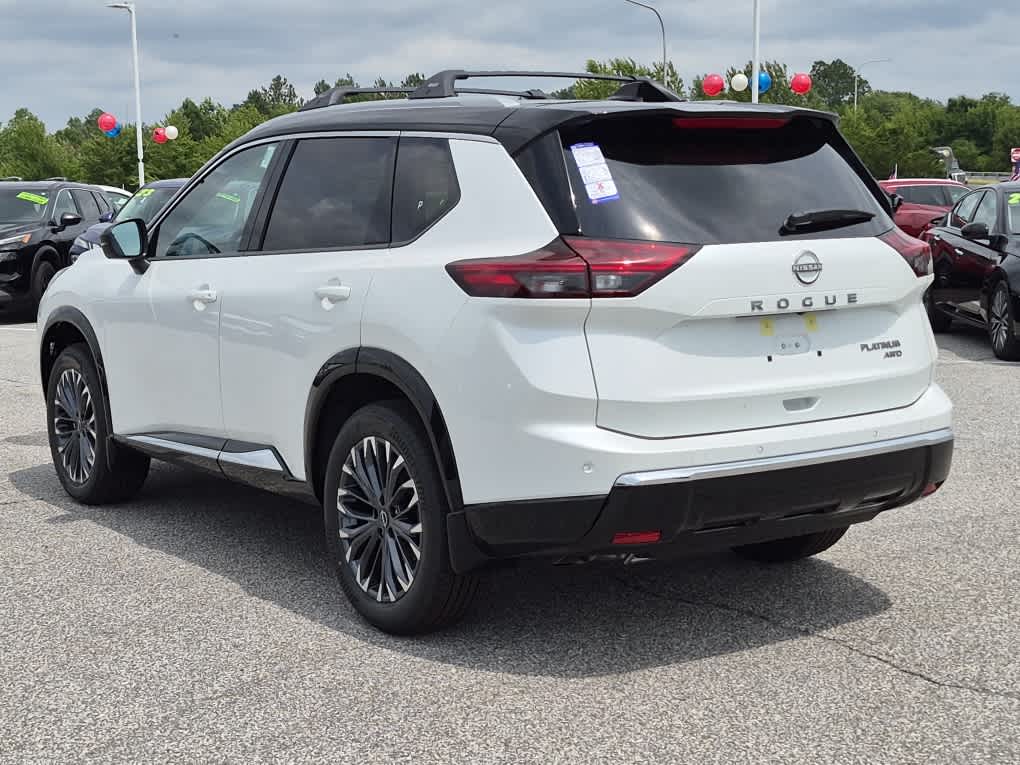 2026 Nissan Rogue Platinum - Everest White Pearl/Super Black exterior view 4