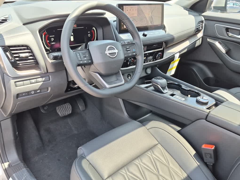 2026 Nissan Rogue Platinum - Champagne Silver Metallic exterior view 12