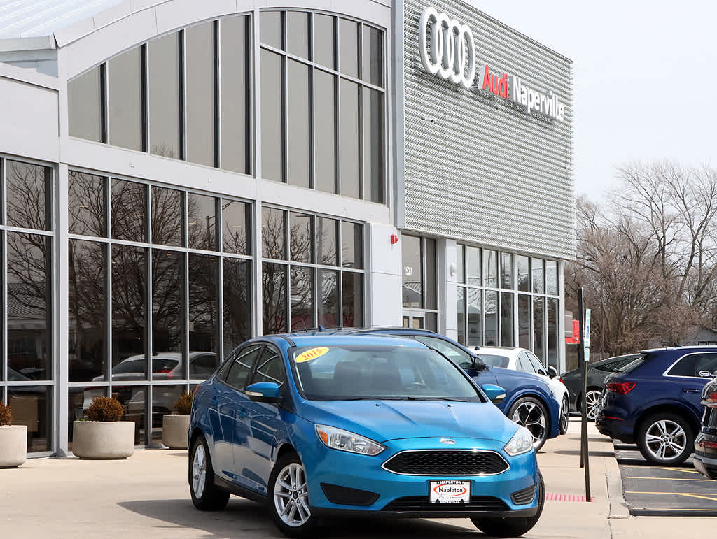 Blue Candy Metallic Tinted Clearcoat 2015 Ford Focus SE Sedan Front-Wheel Drive 6-Speed Automatic