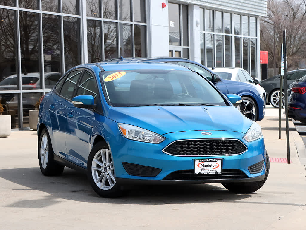 Blue Candy Metallic Tinted Clearcoat 2015 Ford Focus SE Sedan Front-Wheel Drive 6-Speed Automatic
