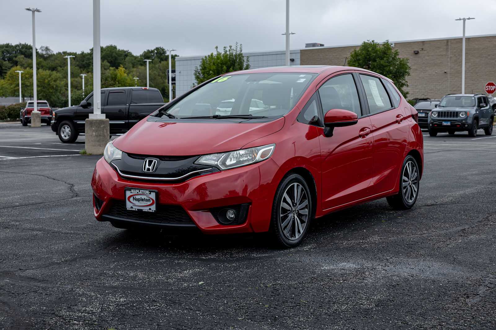 Red 2016 Honda Fit Hatchback Front-Wheel Drive Continuously Variable Transmission