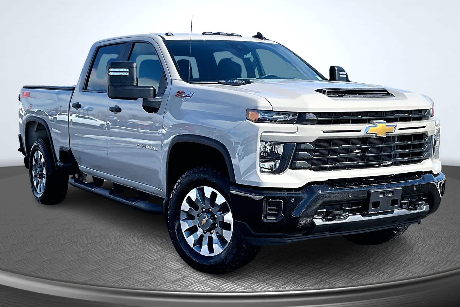2026 Chevrolet Silverado 2500HD Custom White Sands at James Chevrolet