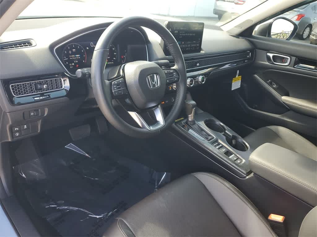 Used 2023 Honda Civic Touring with VIN 2HGFE1F92PH307457 for sale in Florida City, FL