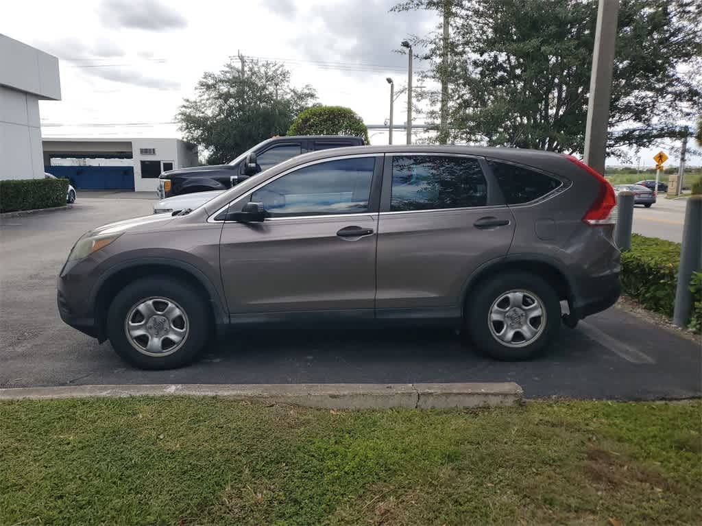 Used 2013 Honda CR-V LX with VIN 3CZRM3H39DG700204 for sale in Florida City, FL