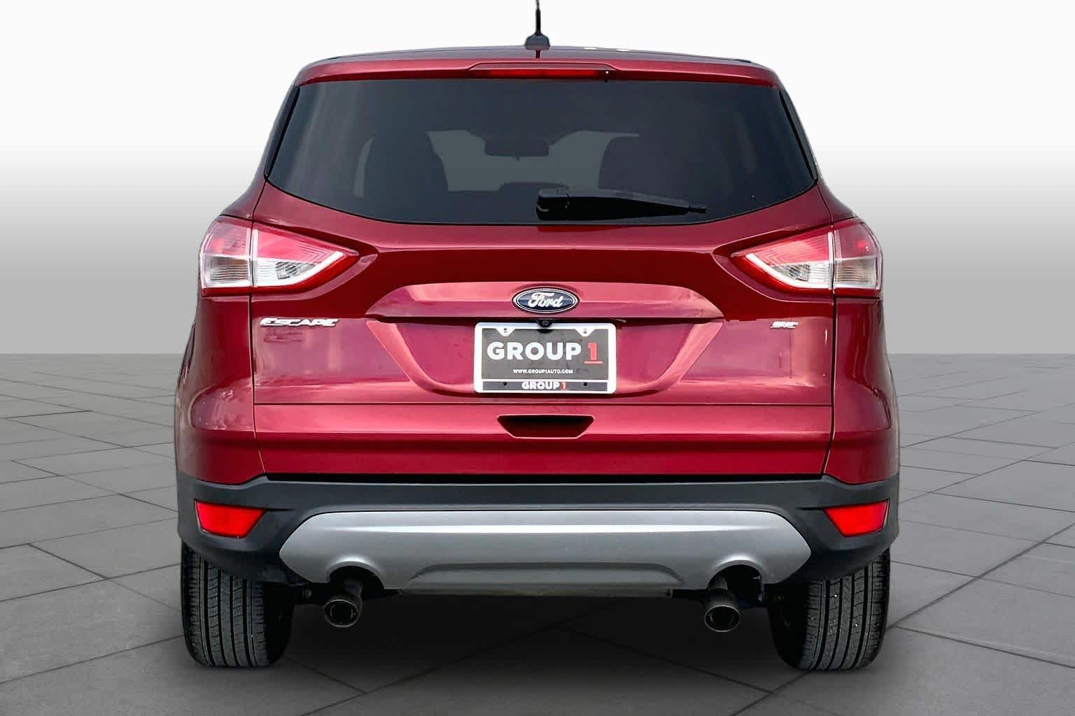 2016 Ford Escape SE Ruby Red Metallic Tinted Clearcoat at AutoNation USA Katy