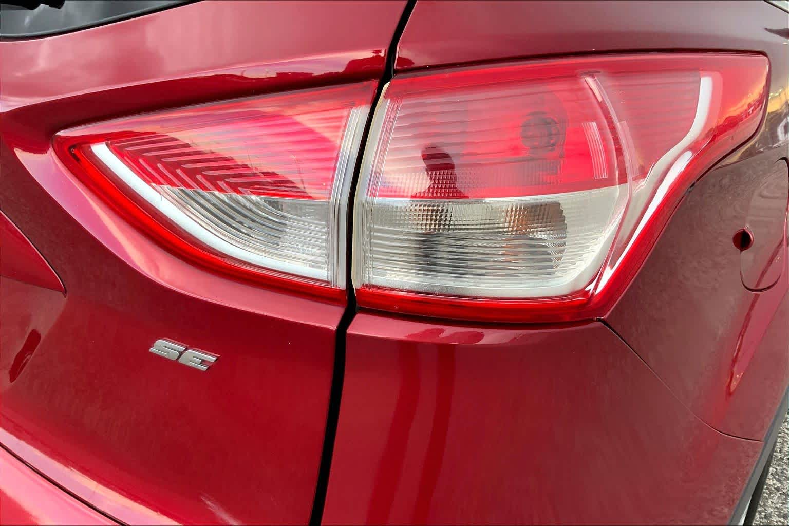 2016 Ford Escape SE Ruby Red Metallic Tinted Clearcoat at AutoNation USA Katy