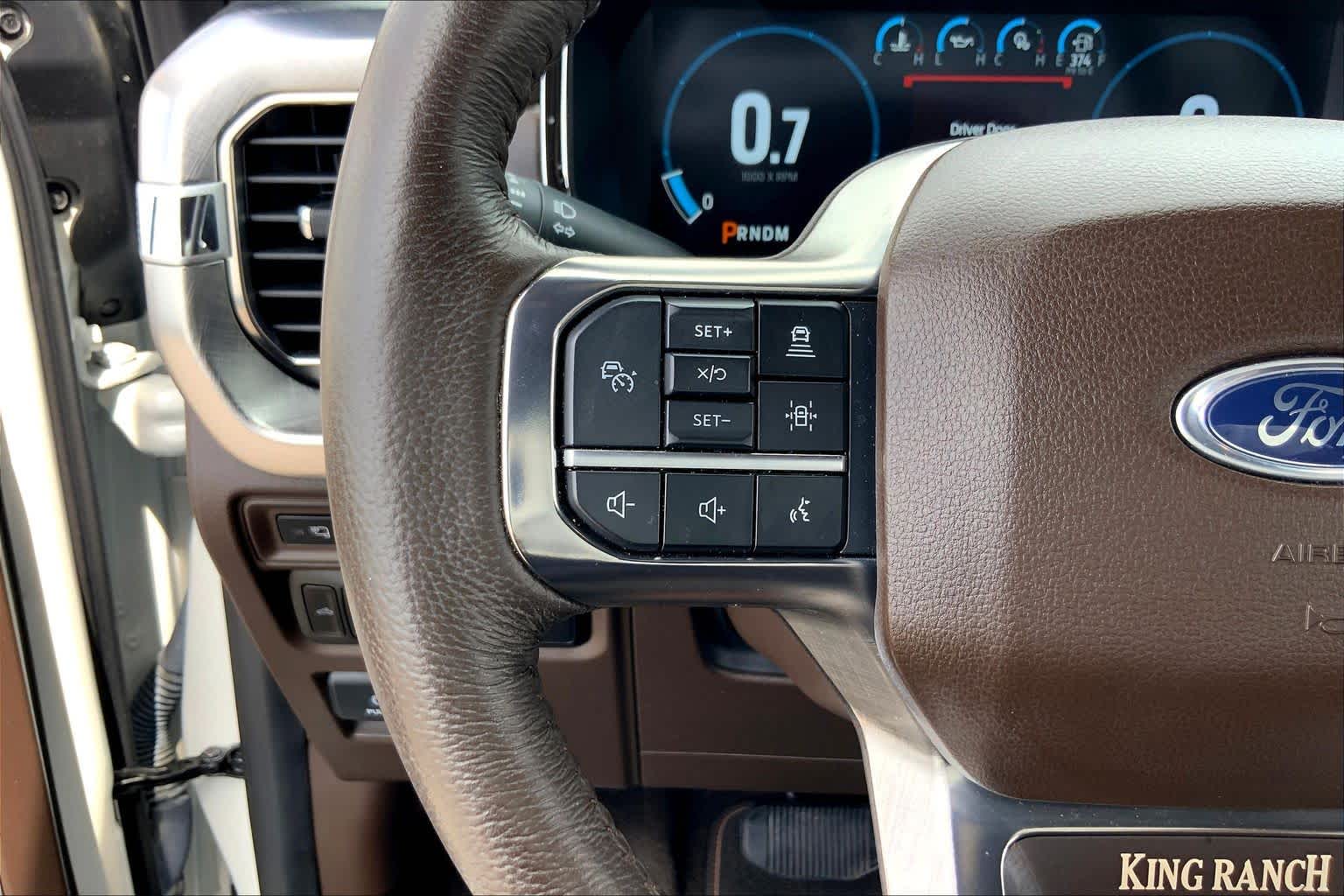2023 Ford F-150 King Ranch Star White Metallic Tri-Coat/Stone Gray at Texan GMC Buick