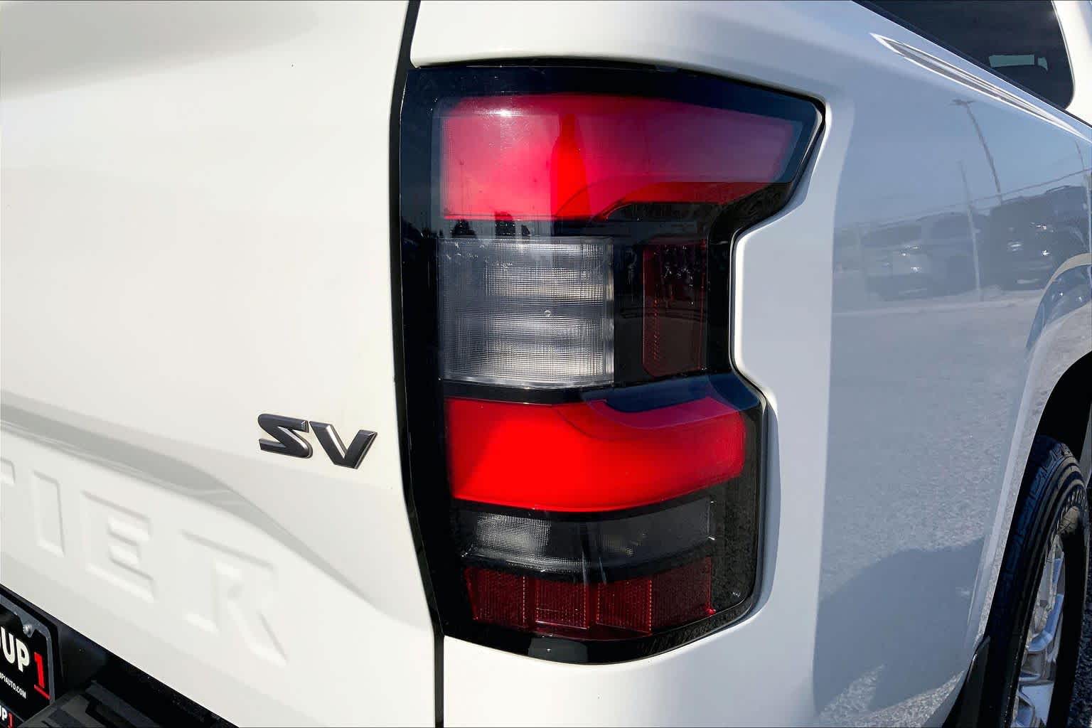 2023 Nissan Frontier SV Glacier White at Sterling McCall Nissan