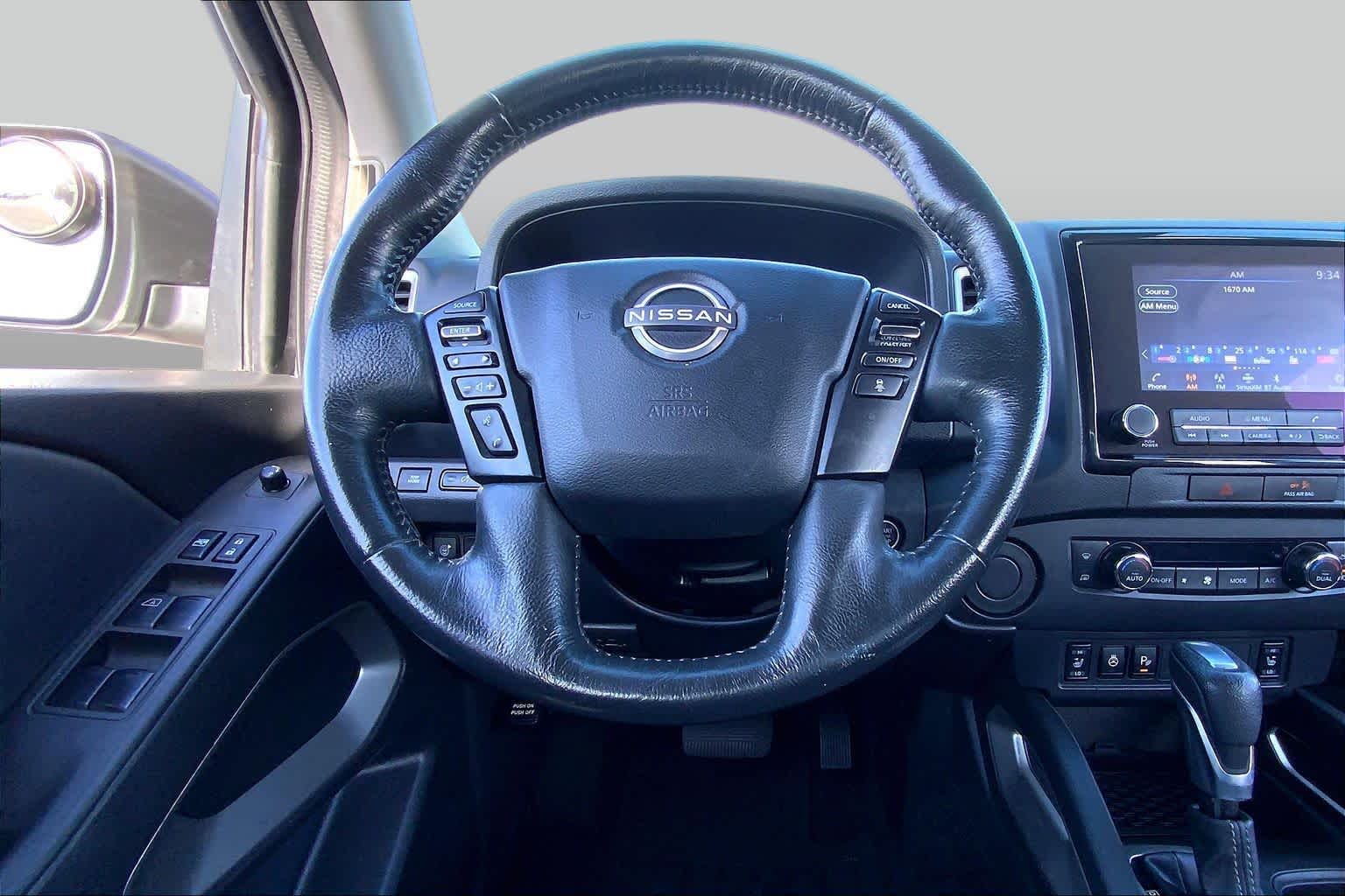 2023 Nissan Frontier SV Glacier White at Sterling McCall Nissan