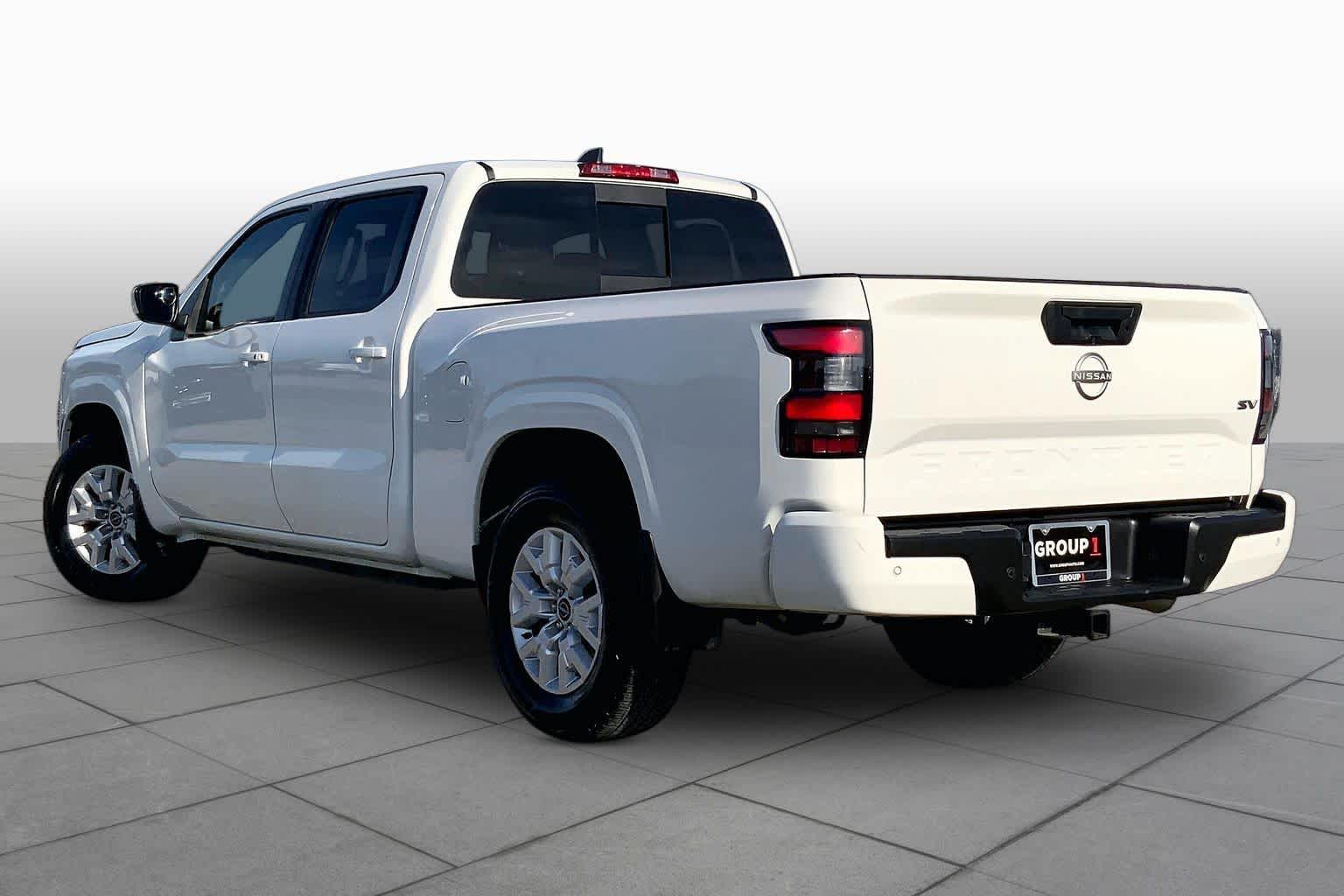 2023 Nissan Frontier SV Glacier White at Sterling McCall Nissan