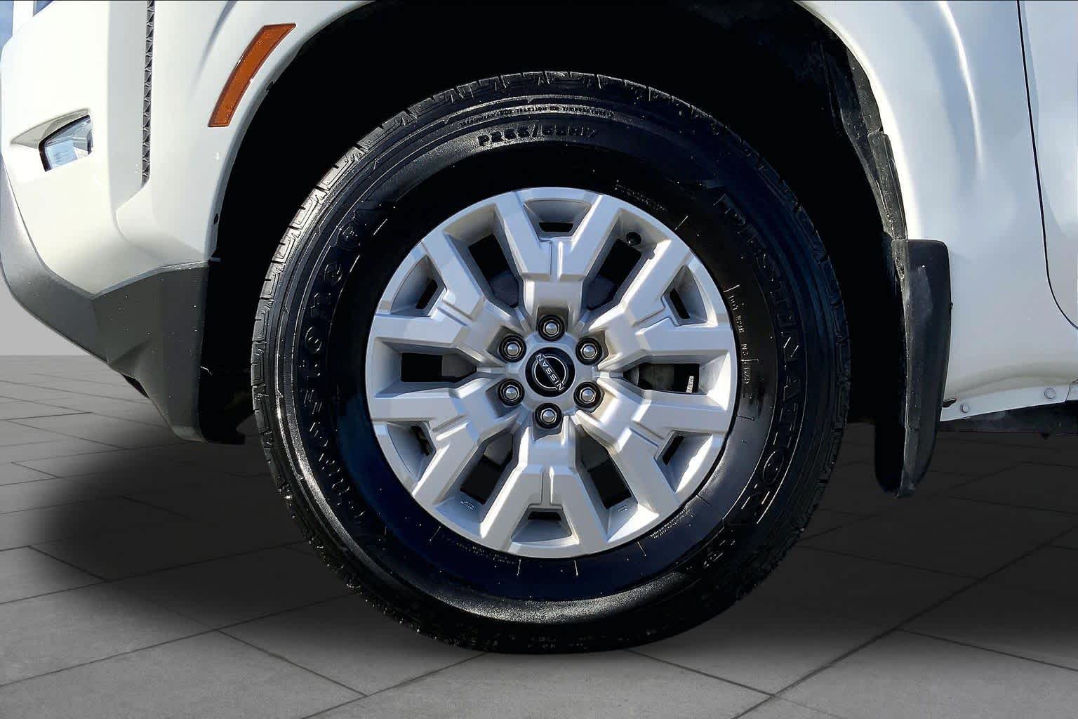 2023 Nissan Frontier SV Glacier White at Sterling McCall Nissan