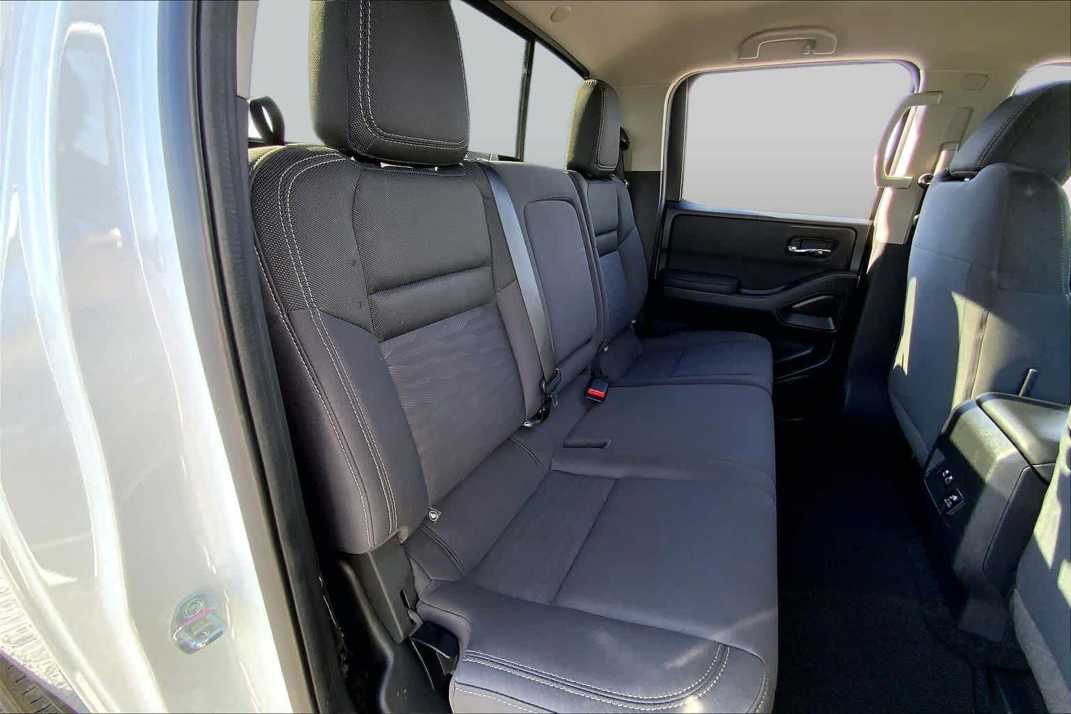 2023 Nissan Frontier SV Glacier White at Sterling McCall Nissan