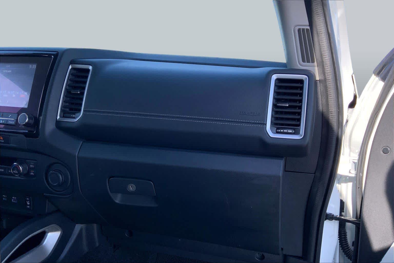 2023 Nissan Frontier SV Glacier White at Sterling McCall Nissan