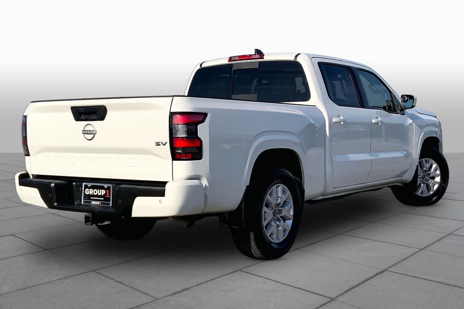 2023 Nissan Frontier SV Glacier White at Sterling McCall Nissan