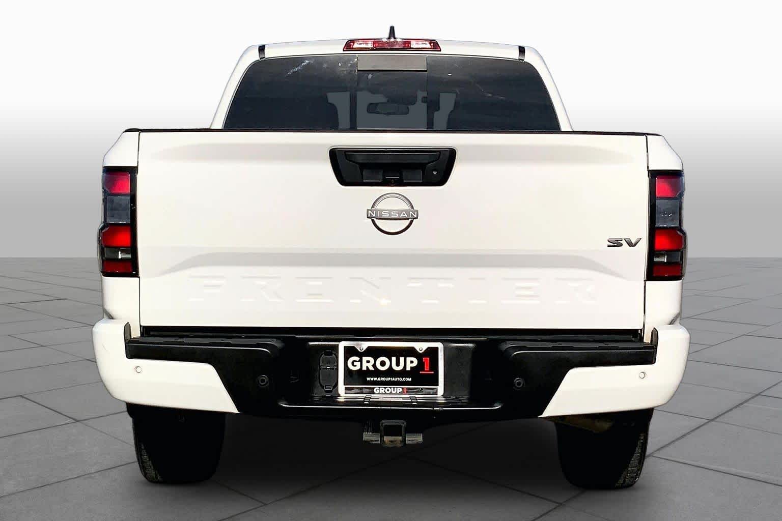 2023 Nissan Frontier SV Glacier White at Sterling McCall Nissan