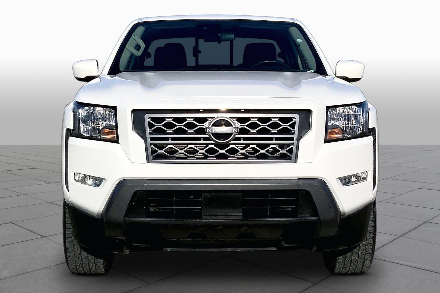 2023 Nissan Frontier SV Glacier White at Sterling McCall Nissan
