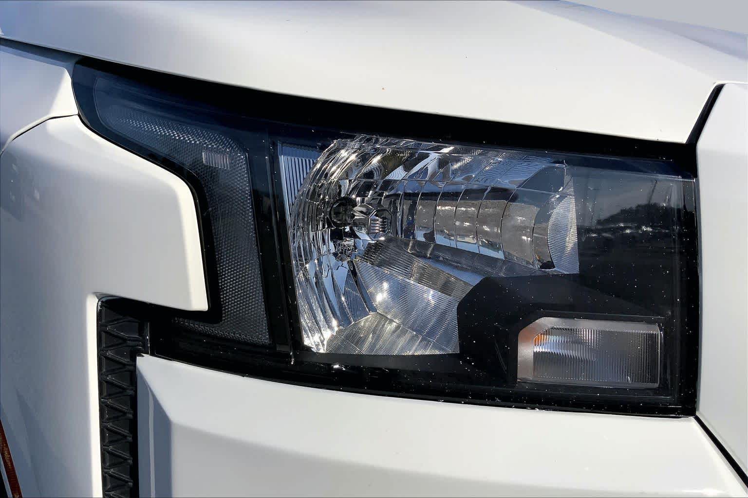 2023 Nissan Frontier SV Glacier White at Sterling McCall Nissan