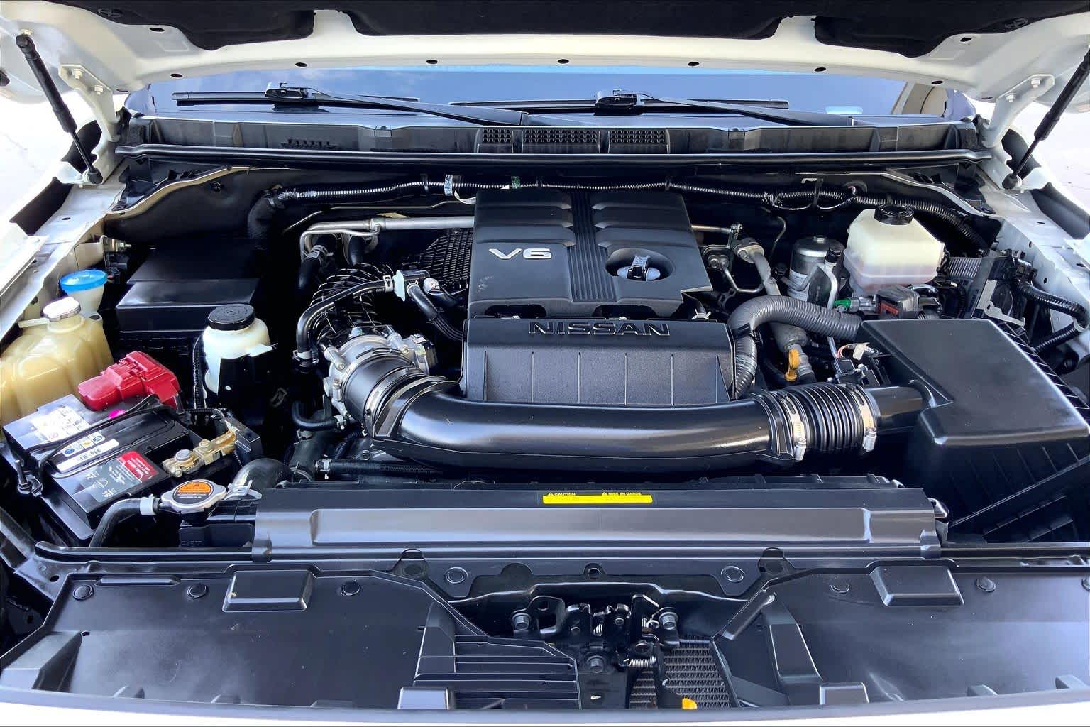 2023 Nissan Frontier SV Glacier White at Sterling McCall Nissan