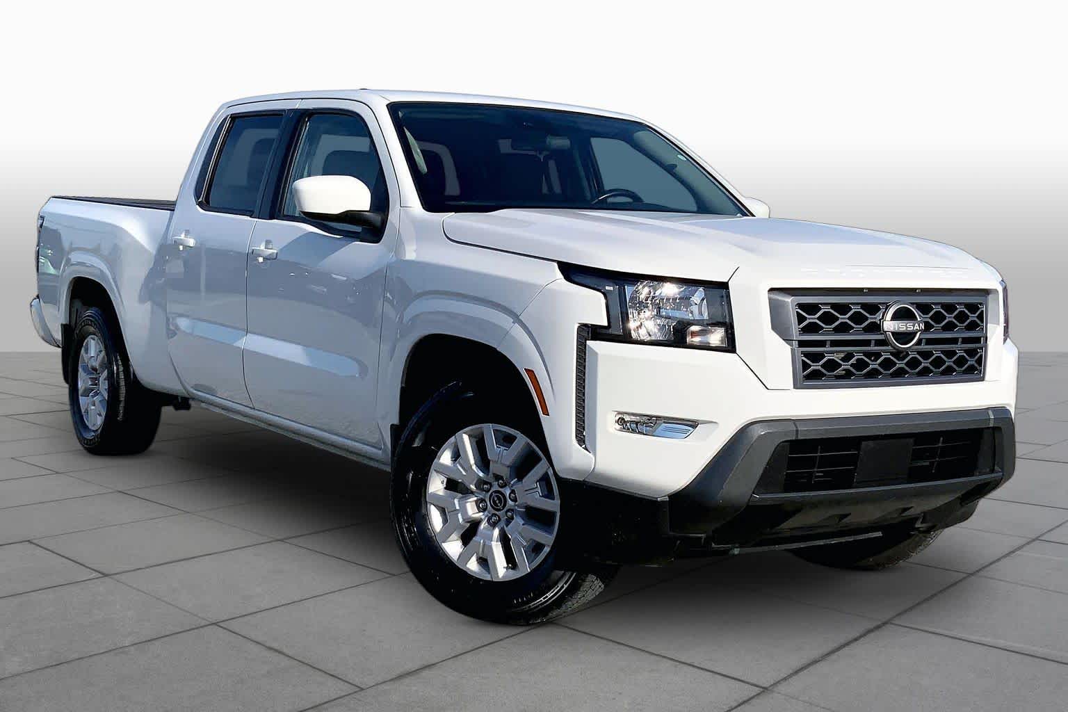 2023 Nissan Frontier SV Glacier White at Sterling McCall Nissan