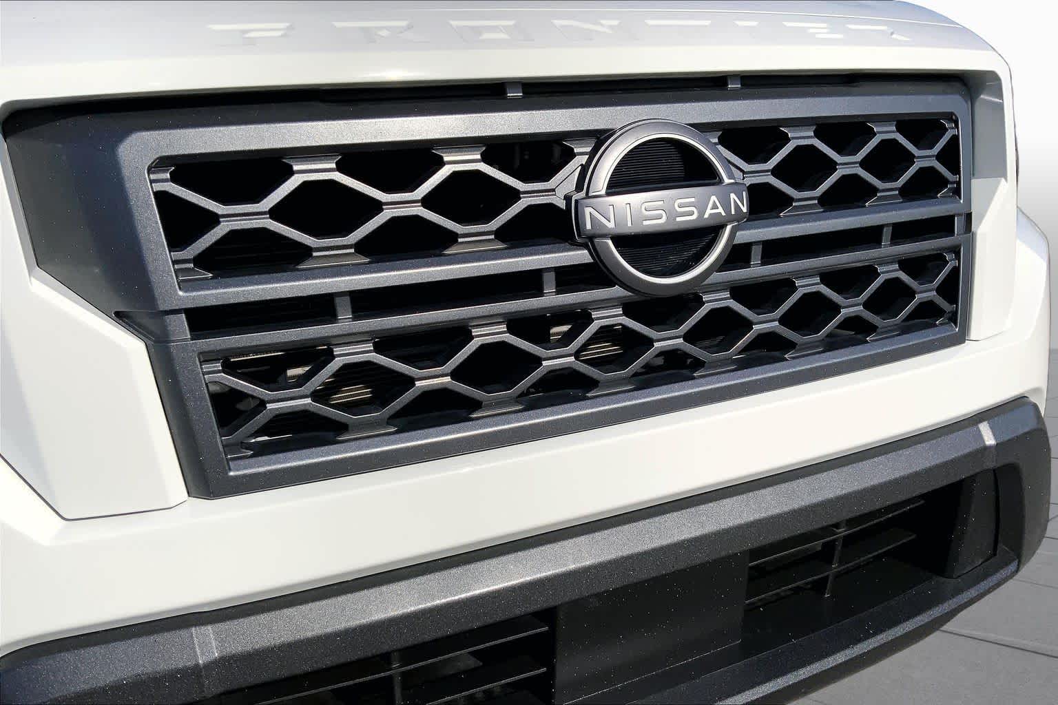 2023 Nissan Frontier SV Glacier White at Sterling McCall Nissan