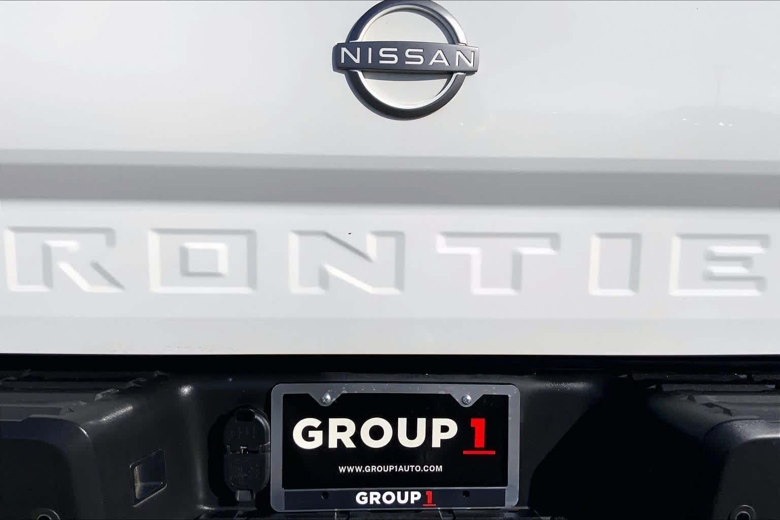 2023 Nissan Frontier SV Glacier White at Sterling McCall Nissan