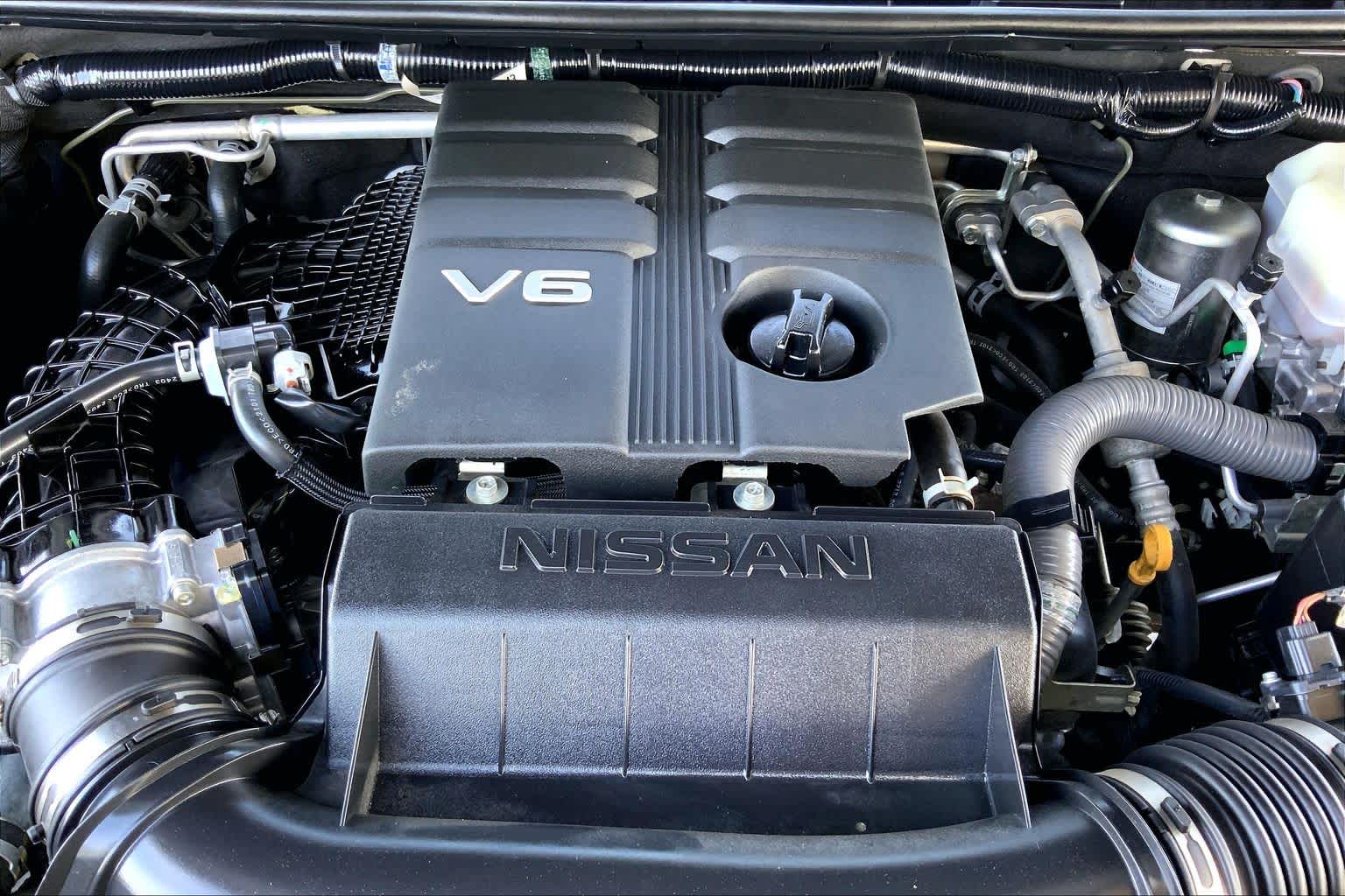 2023 Nissan Frontier SV Glacier White at Sterling McCall Nissan