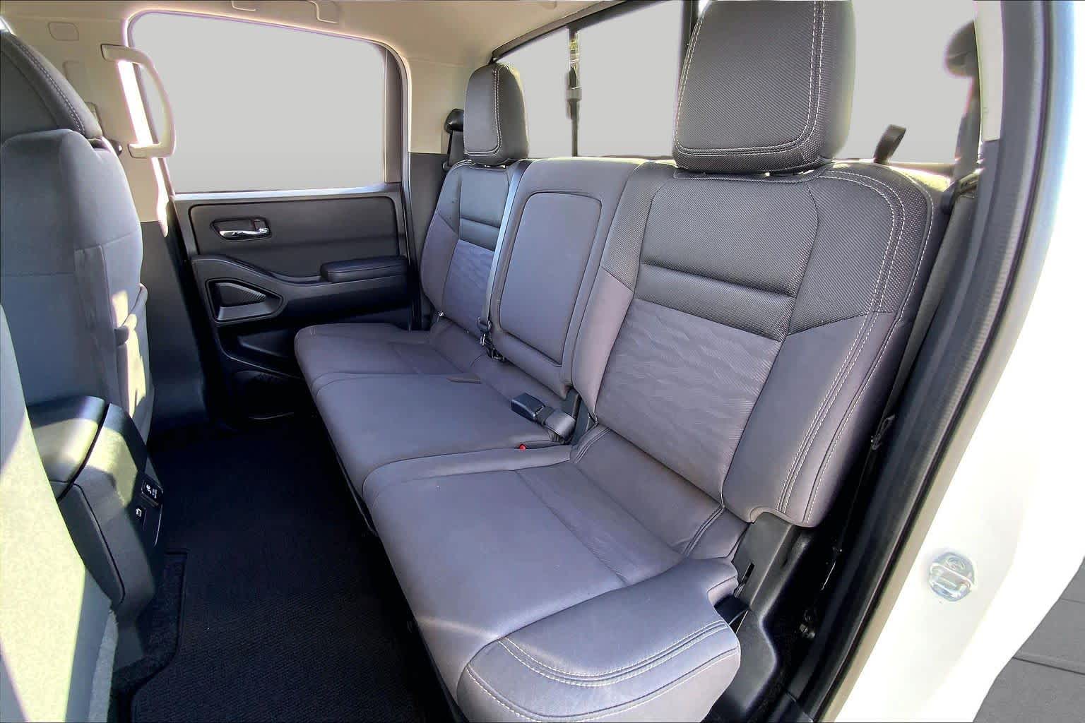 2023 Nissan Frontier SV Glacier White at Sterling McCall Nissan