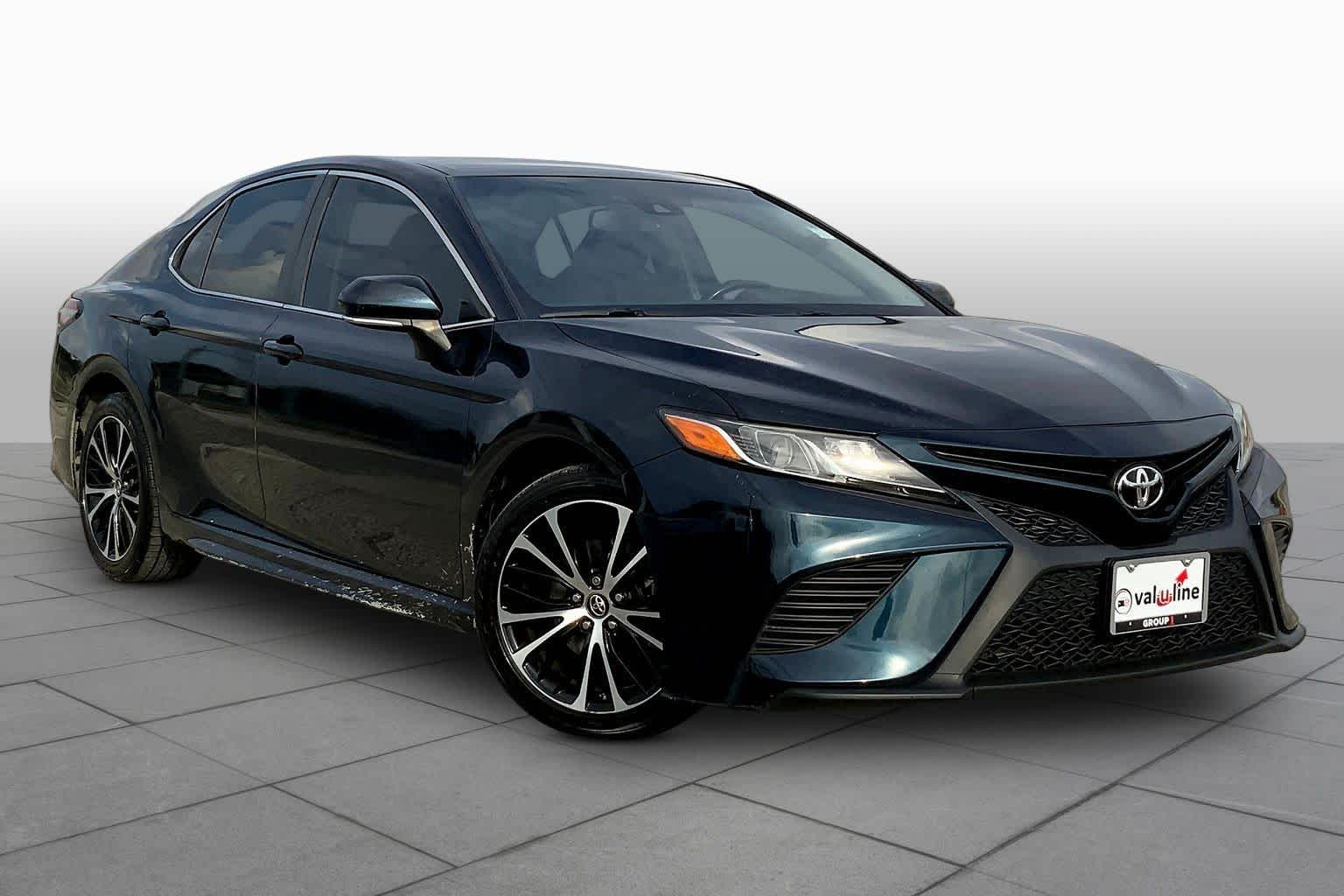 View vehicle photo 3