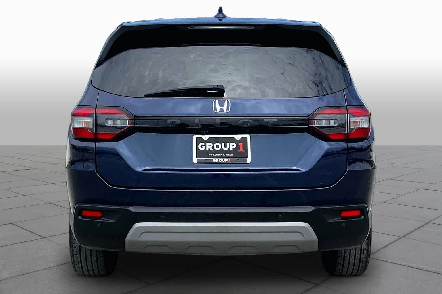 2024 Honda Pilot EX-L 8 Passenger Obsidian Blue Pearl at Tomball Ford