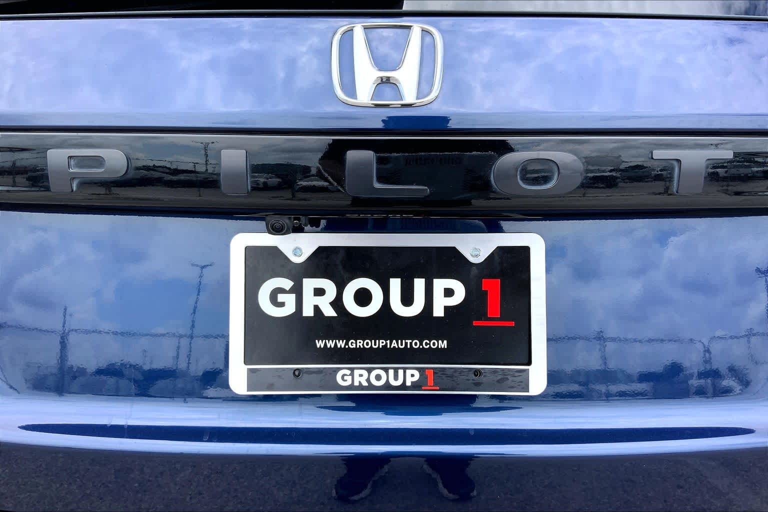2024 Honda Pilot EX-L 8 Passenger Obsidian Blue Pearl at Tomball Ford