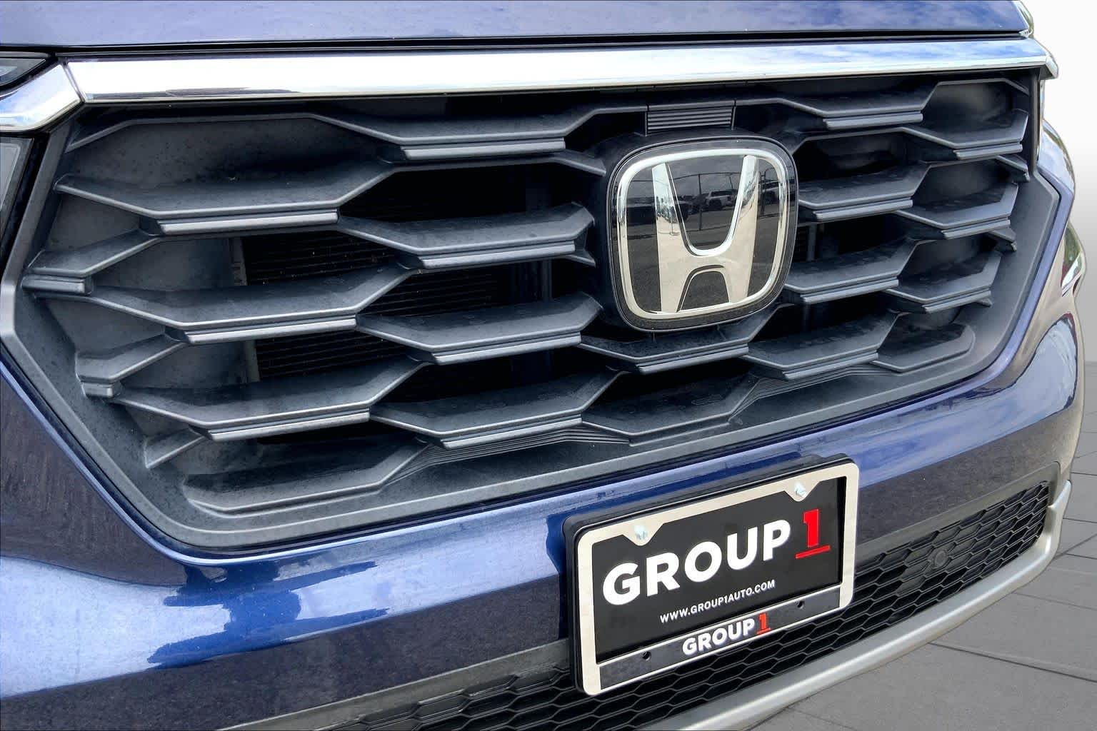 2024 Honda Pilot EX-L 8 Passenger Obsidian Blue Pearl at Tomball Ford