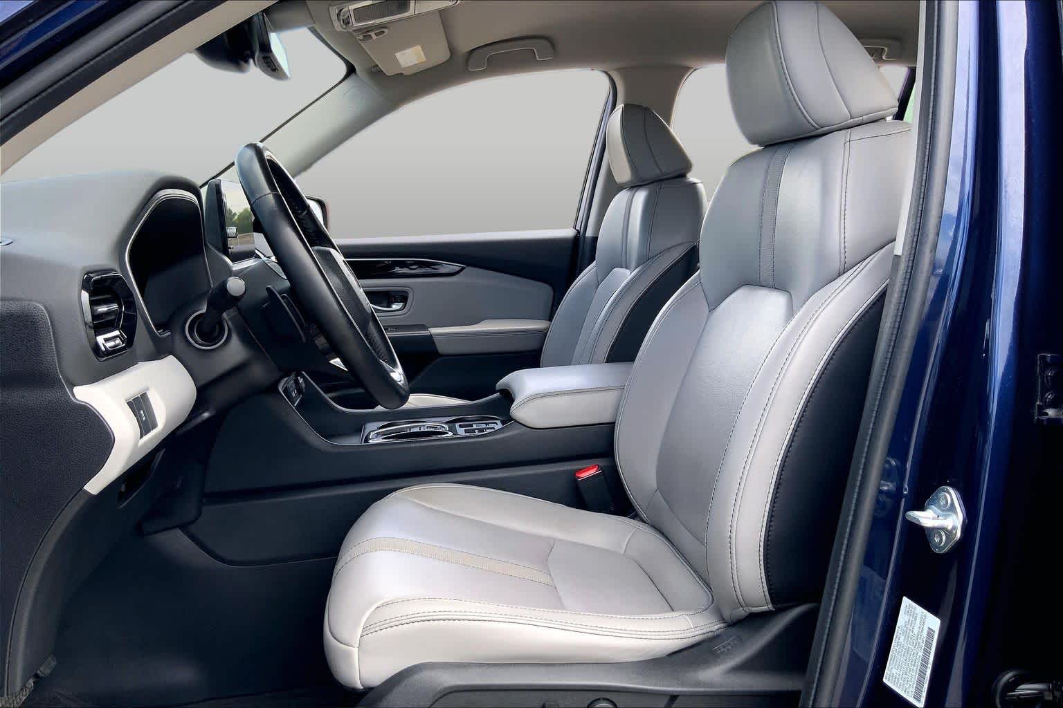 2024 Honda Pilot EX-L 8 Passenger Obsidian Blue Pearl at Tomball Ford