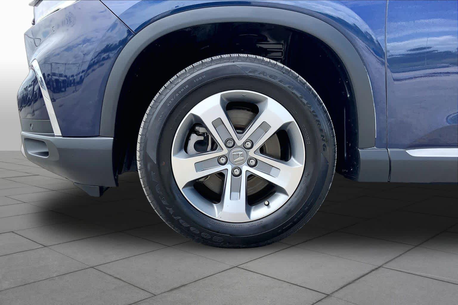 2024 Honda Pilot EX-L 8 Passenger Obsidian Blue Pearl at Tomball Ford