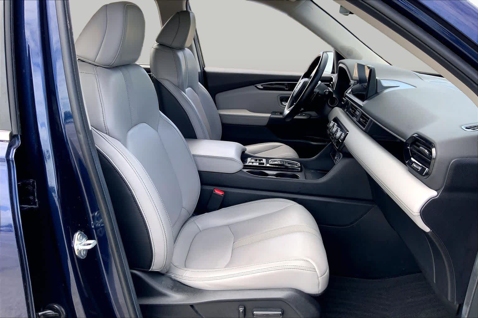 2024 Honda Pilot EX-L 8 Passenger Obsidian Blue Pearl at Tomball Ford
