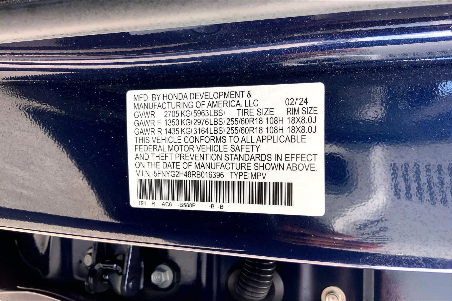 2024 Honda Pilot EX-L 8 Passenger Obsidian Blue Pearl at Tomball Ford