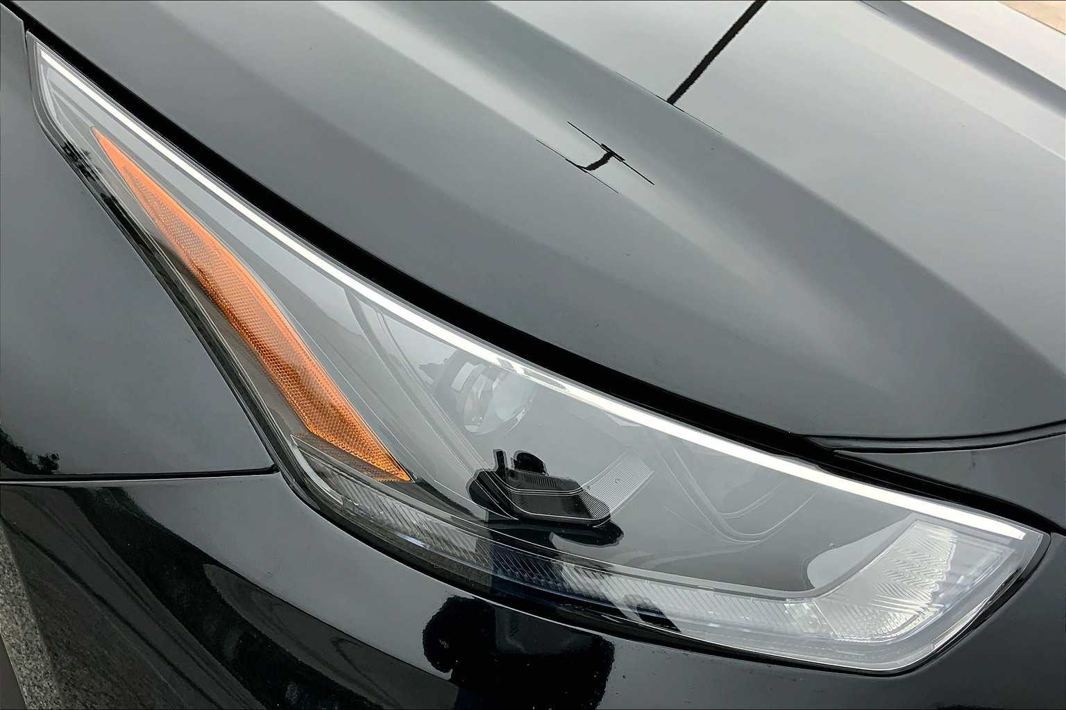 2023 Toyota Highlander Hybrid LE Midnight Black Metallic at Group 1 Toyota Southwest