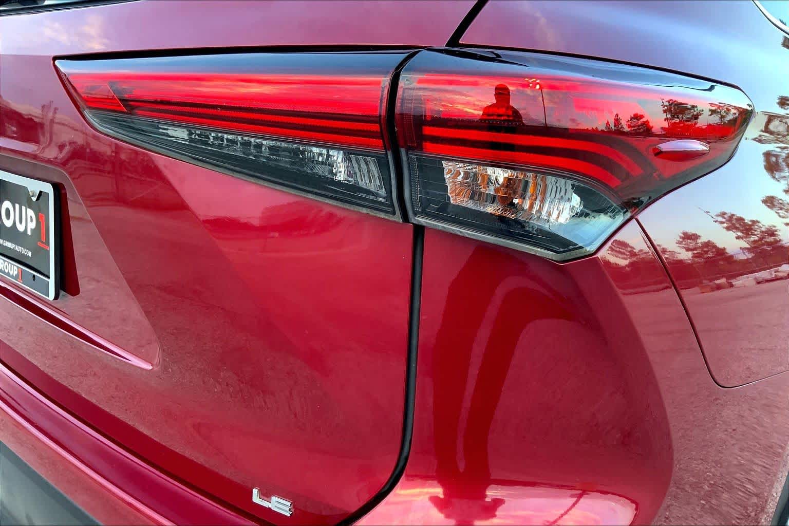 2022 Toyota Highlander LE Ruby Flare Pearl at AutoNation Chrysler Jeep Dodge Ram Spring