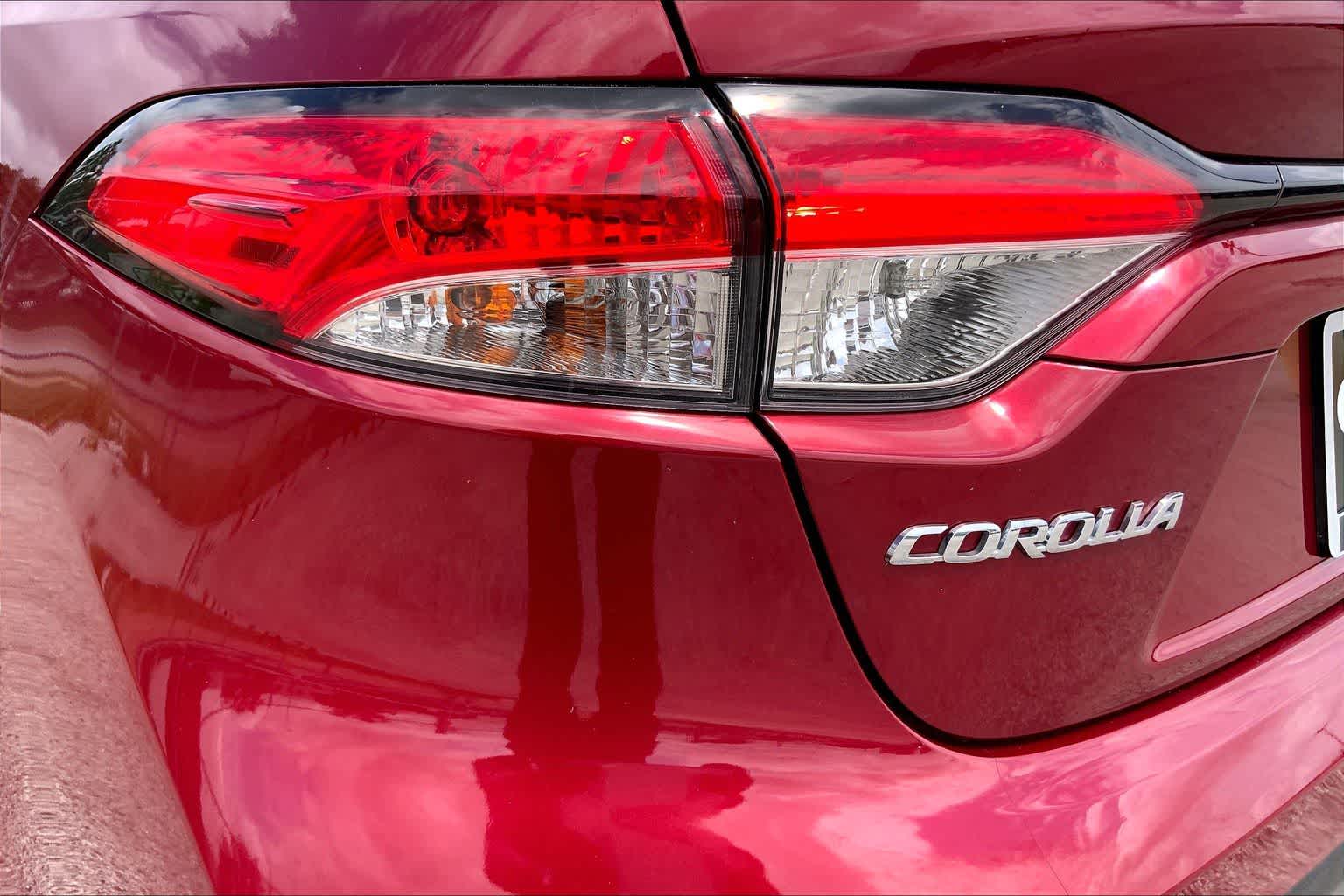 2024 Toyota Corolla LE Ruby Flare Pearl at HGreg Houston