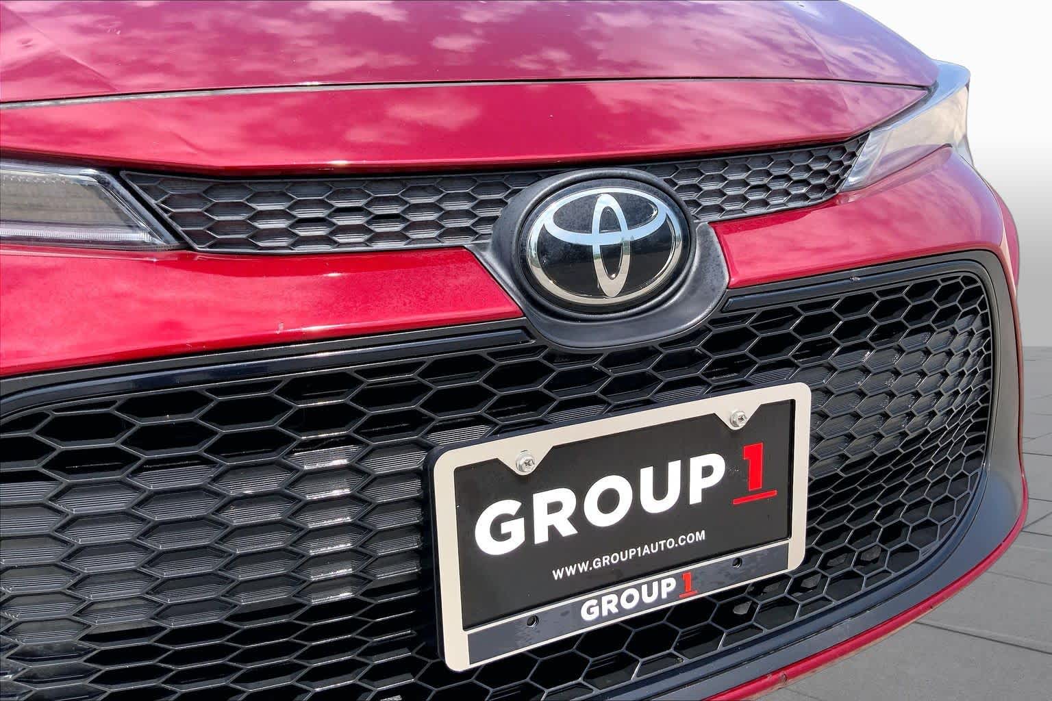 2022 Toyota Corolla LE Ruby Flare Pearl at HGreg Houston