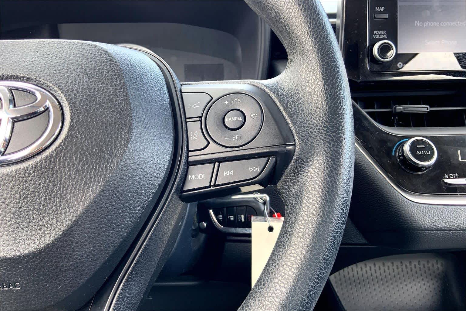 2022 Toyota Corolla LE Ruby Flare Pearl at HGreg Houston