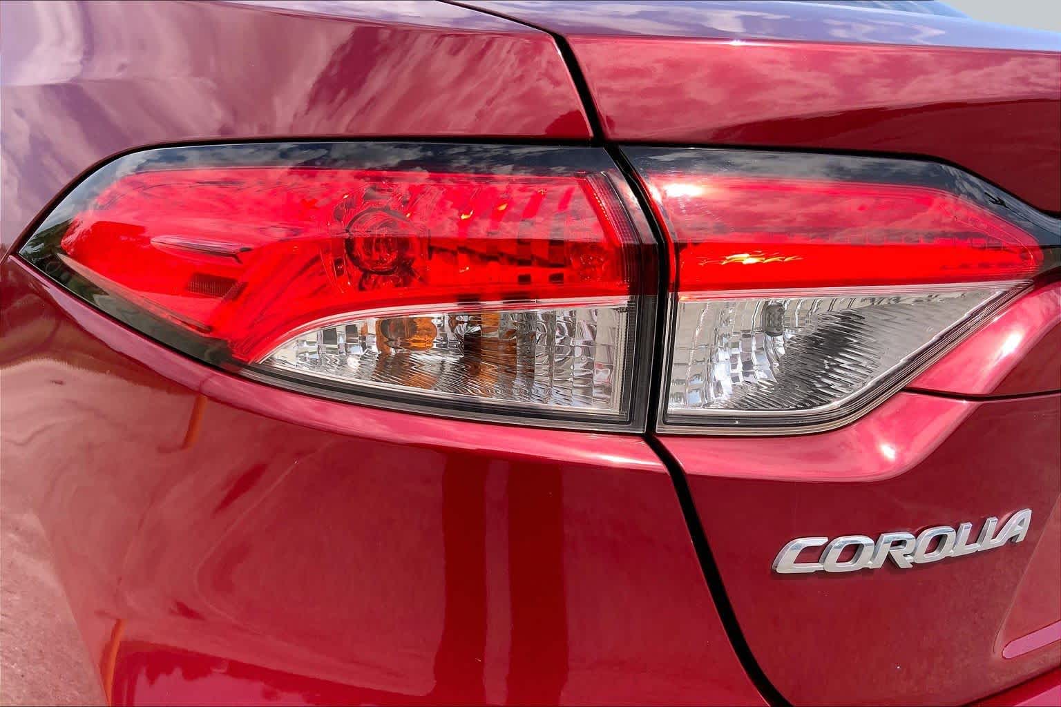 2022 Toyota Corolla LE Ruby Flare Pearl at HGreg Houston
