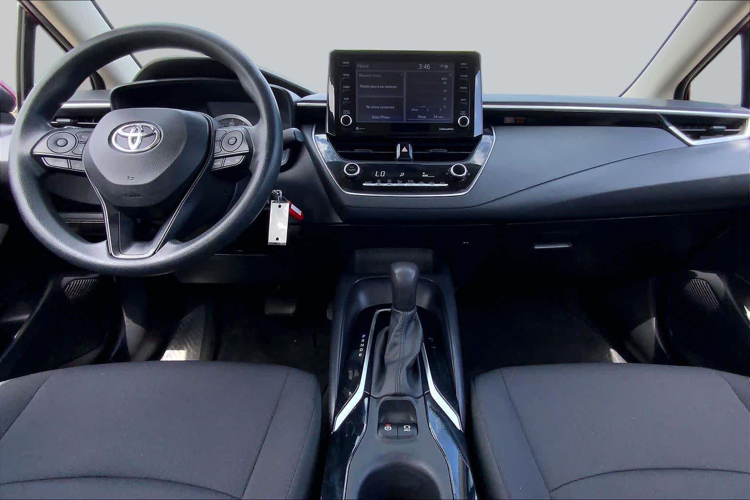 2022 Toyota Corolla LE Ruby Flare Pearl at HGreg Houston