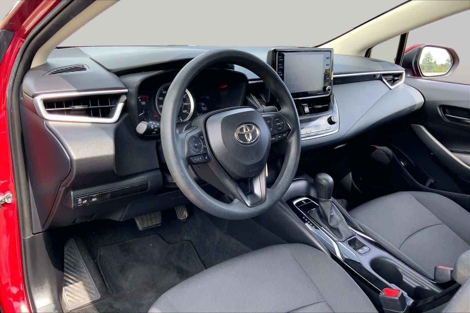 2022 Toyota Corolla LE Ruby Flare Pearl at HGreg Houston