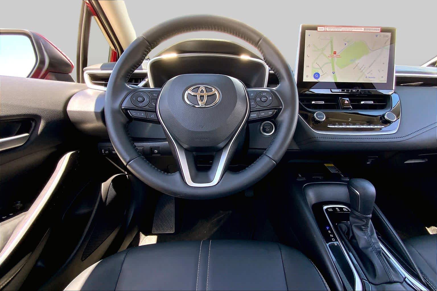 2026 Toyota Corolla Hybrid XLE Ruby Flare Pearl at Team Toyota