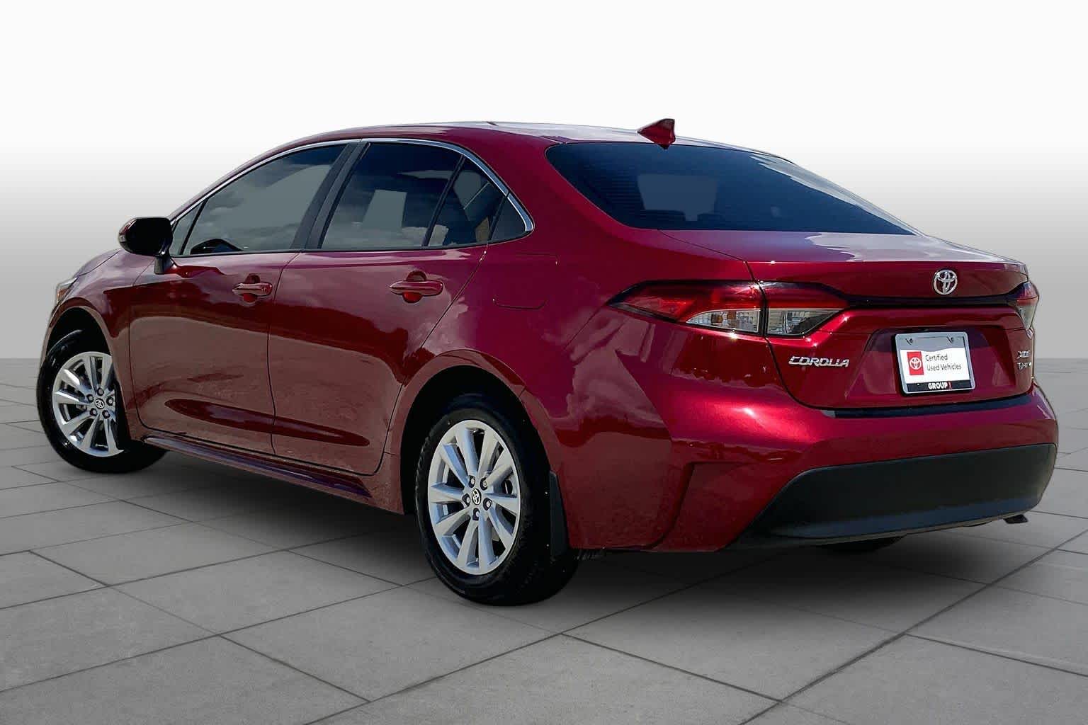 2026 Toyota Corolla Hybrid XLE Ruby Flare Pearl at Team Toyota
