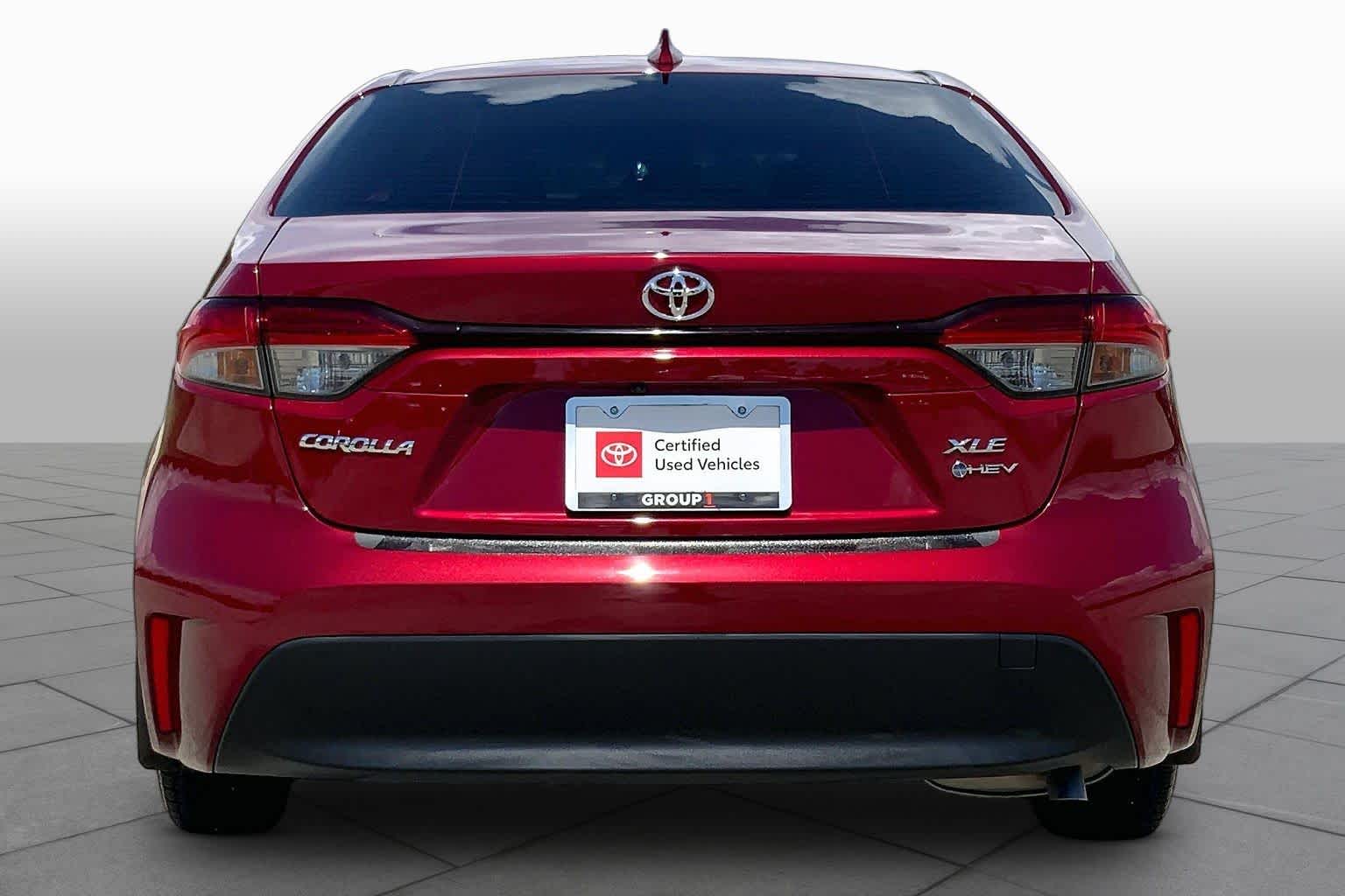 2026 Toyota Corolla Hybrid XLE Ruby Flare Pearl at Team Toyota