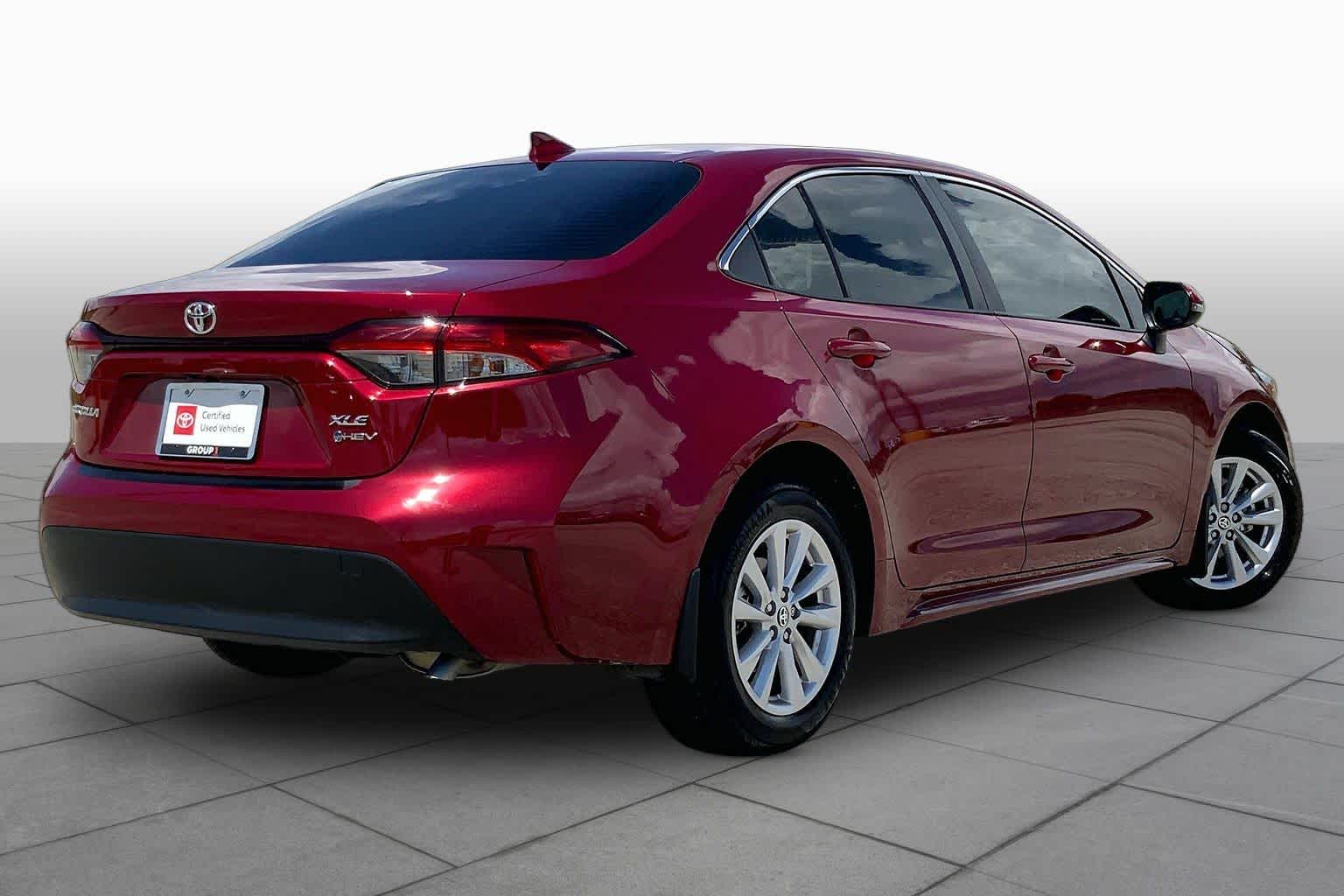 2026 Toyota Corolla Hybrid XLE Ruby Flare Pearl at Team Toyota