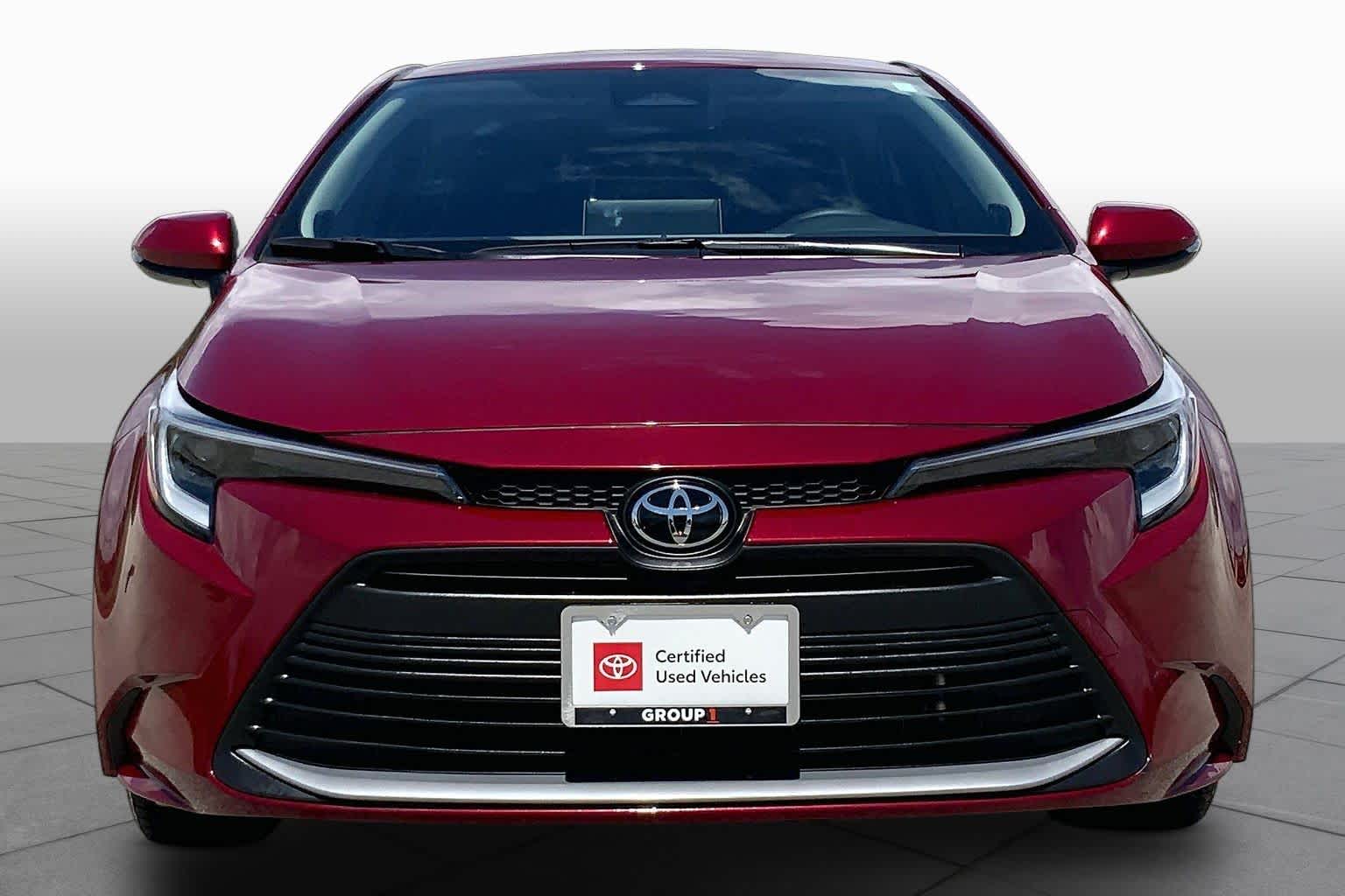 2026 Toyota Corolla Hybrid XLE Ruby Flare Pearl at Team Toyota
