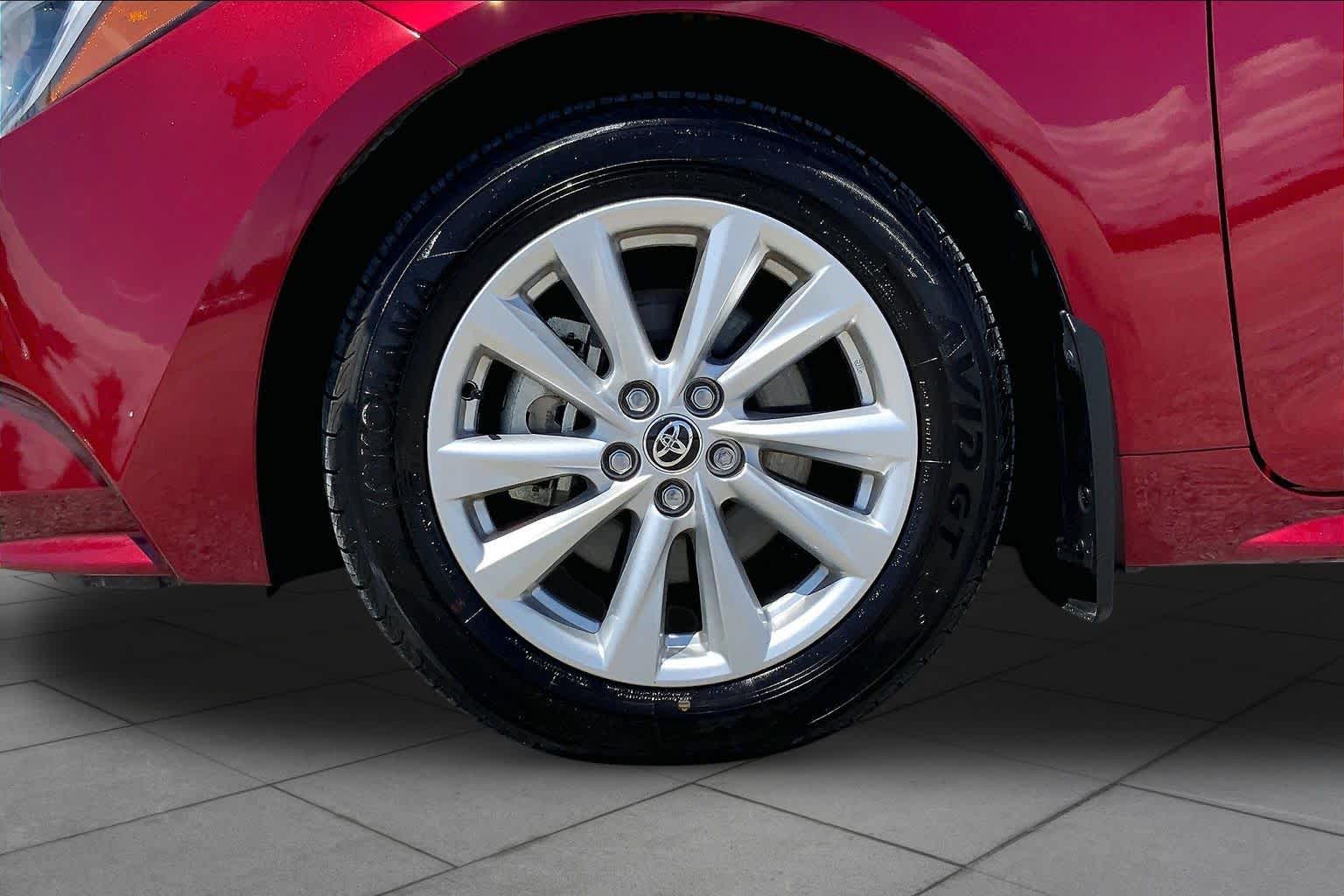 2026 Toyota Corolla Hybrid XLE Ruby Flare Pearl at Team Toyota