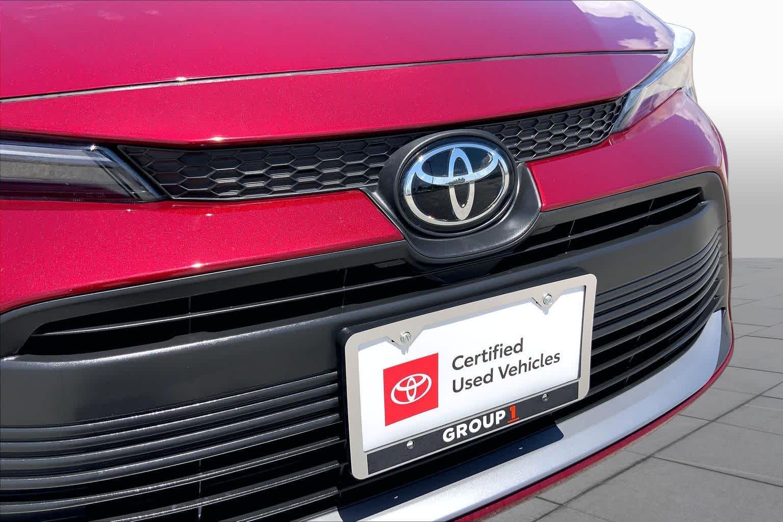 2026 Toyota Corolla Hybrid XLE Ruby Flare Pearl at Team Toyota